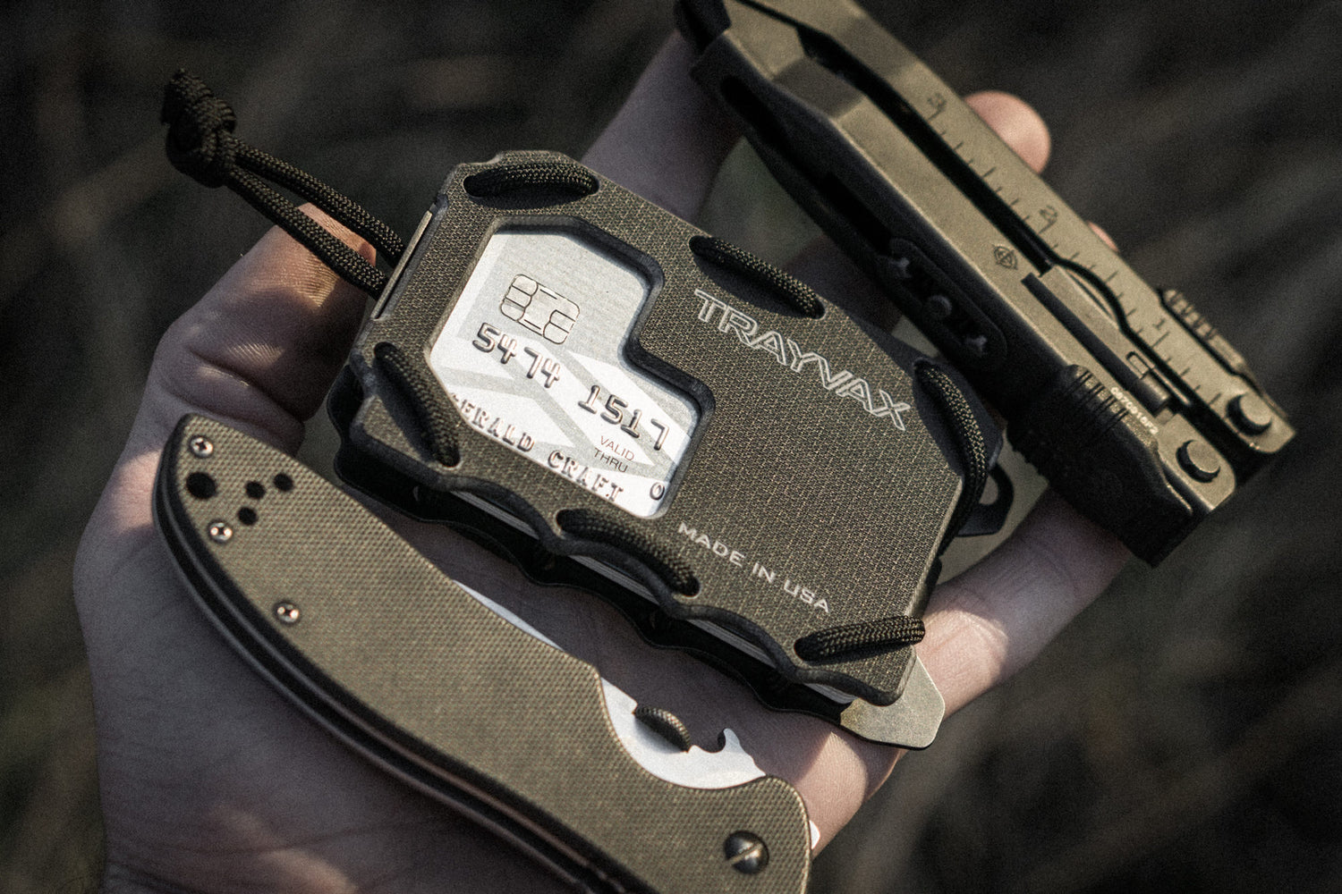 Original 2.0 Wallet Made From G10 Material in Hand with Multi-tool and Folding Knife