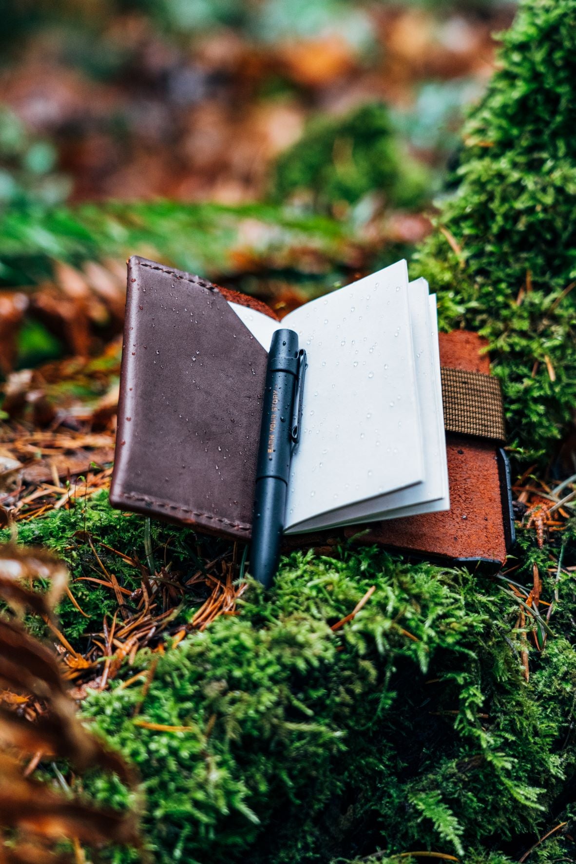 Trayvax Summit Notebook Open Laying On Moss