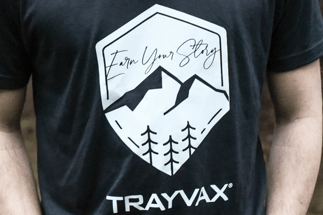 Trayvax Enterprises Apparel The Merit Badge T-Shirt